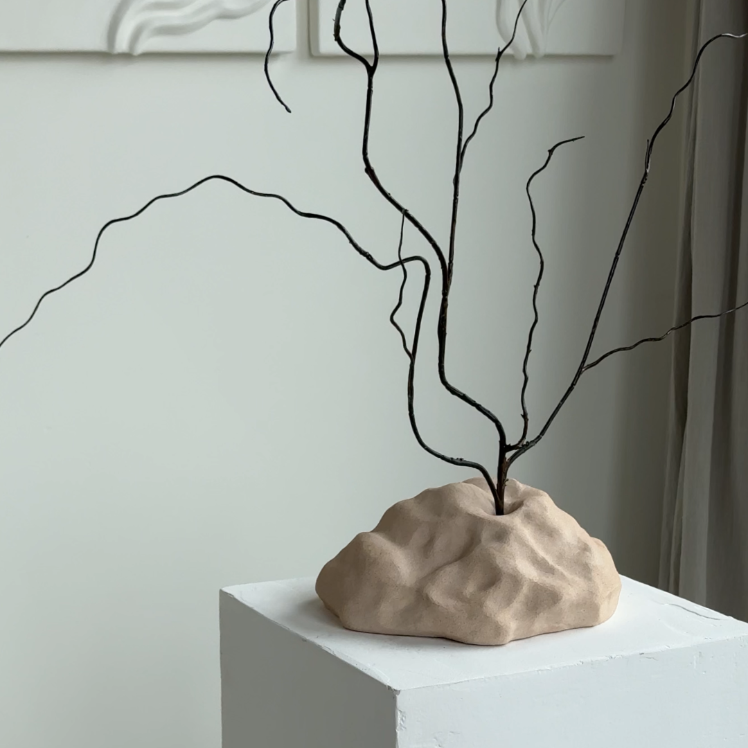 hand-poured micro concrete sculpture, modern minimalist art piece, unique concrete decor, sculptural home accent, almond beige stone-look finish, functional art object, vase for single branch or stem, contemporary decor for living room or office, eco-friendly sculptural piece, high-quality concrete art, handmade decor for modern homes, statement art piece, functional decorative sculpture, versatile decor for floral arrangements, premium home decor, bespoke design sculpture, handmade art for home styling, gi