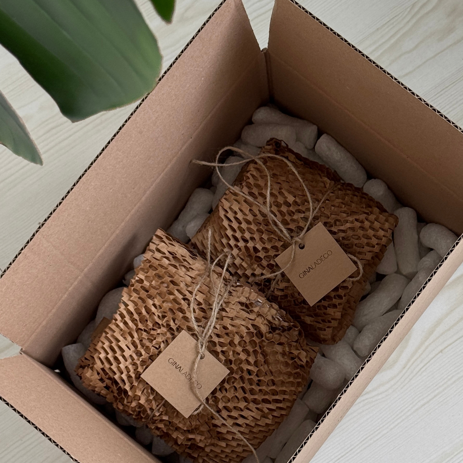 beautifully packaged home decor gift, eco-friendly gift packaging, stylish and sustainable home decor wrapping, premium gift-ready decor, thoughtful gift for home, luxury packaging for home accessories, plastic-free packaging, elegant decor gift packaging, handmade home decor, unique home accessories gift, beautifully wrapped gift for modern homes