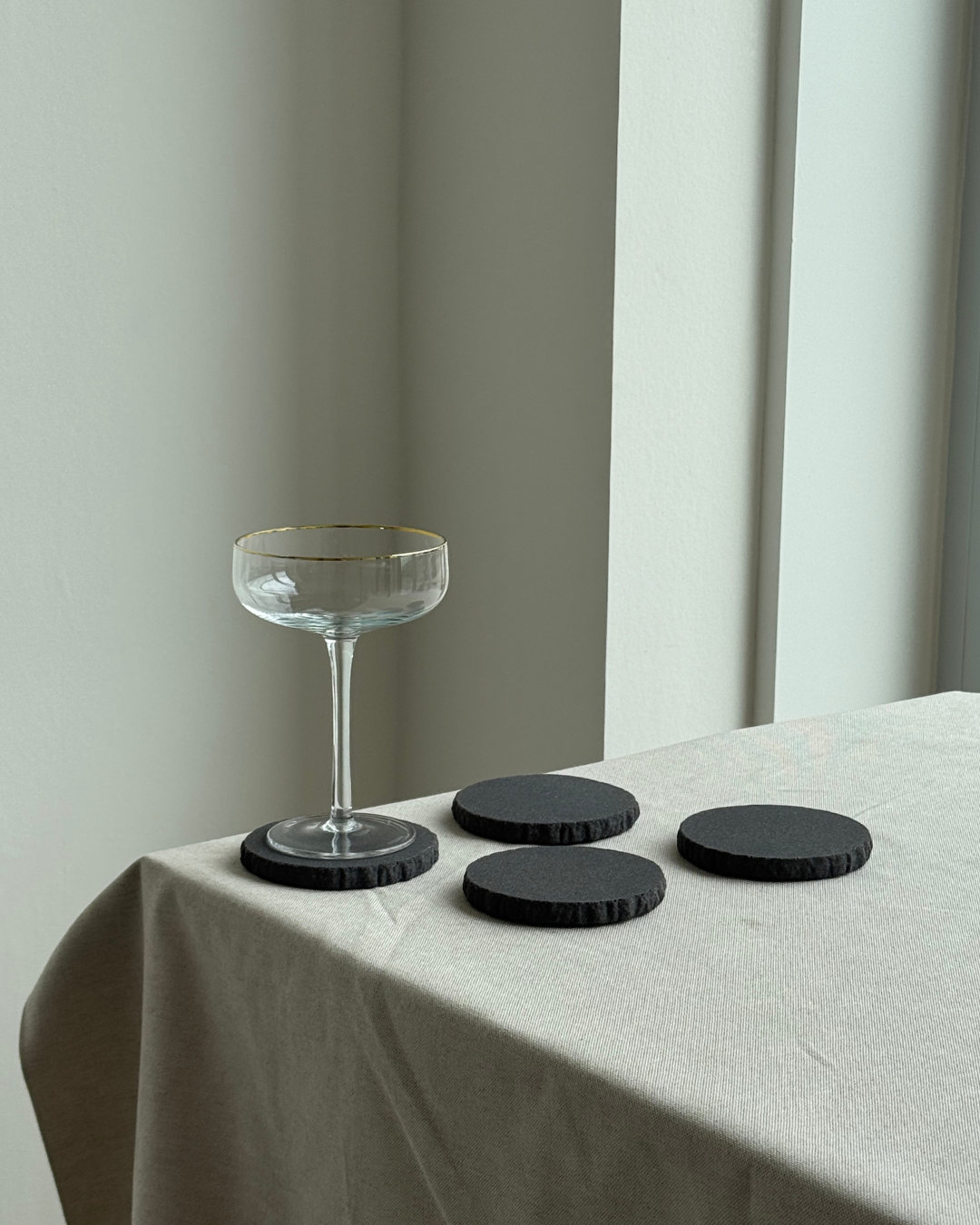 hand-poured micro concrete coasters, modern almond beige stone-look finish, minimalist drink coasters, functional and stylish drink accessories, high-quality concrete home decor, eco-friendly coaster set, contemporary table decor, unique coasters for home, sustainable coasters for drinks, premium concrete drinkware, handmade coasters for dining or living room, versatile coaster set for glass, mug, or cup, perfect gift for home decor lovers, elegant and durable home accessories, ginaladeco