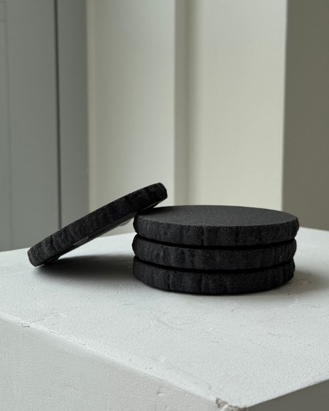 hand-poured micro concrete coasters, modern almond beige stone-look finish, minimalist drink coasters, functional and stylish drink accessories, high-quality concrete home decor, eco-friendly coaster set, contemporary table decor, unique coasters for home, sustainable coasters for drinks, premium concrete drinkware, handmade coasters for dining or living room, versatile coaster set for glass, mug, or cup, perfect gift for home decor lovers, elegant and durable home accessories, ginaladeco
