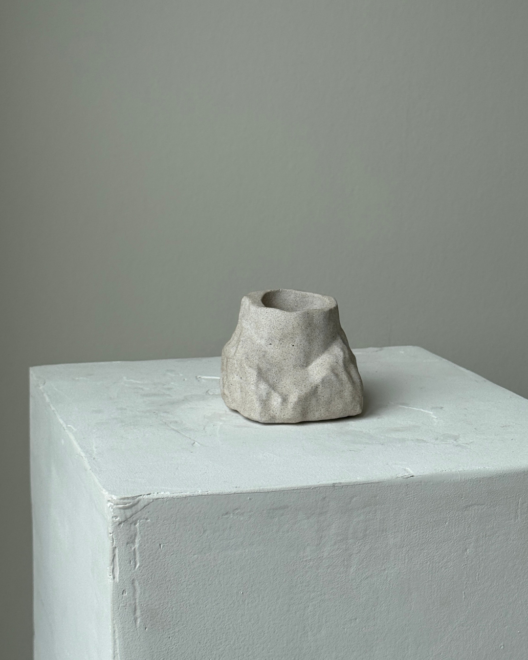 hand-poured micro concrete pen holder, almond beige stone-look finish, modern and minimalist desk organizer, stylish office decor, functional pen holder for home office, unique desk accessory, eco-friendly concrete desk storage, high-quality office supplies, contemporary home decor, versatile storage solution for pens, pencils, and office tools, sculptural office decor, perfect for desk or workspace, gift-ready pen holder, sustainable home office piece, elegant and practical desk organization, ginaladeco