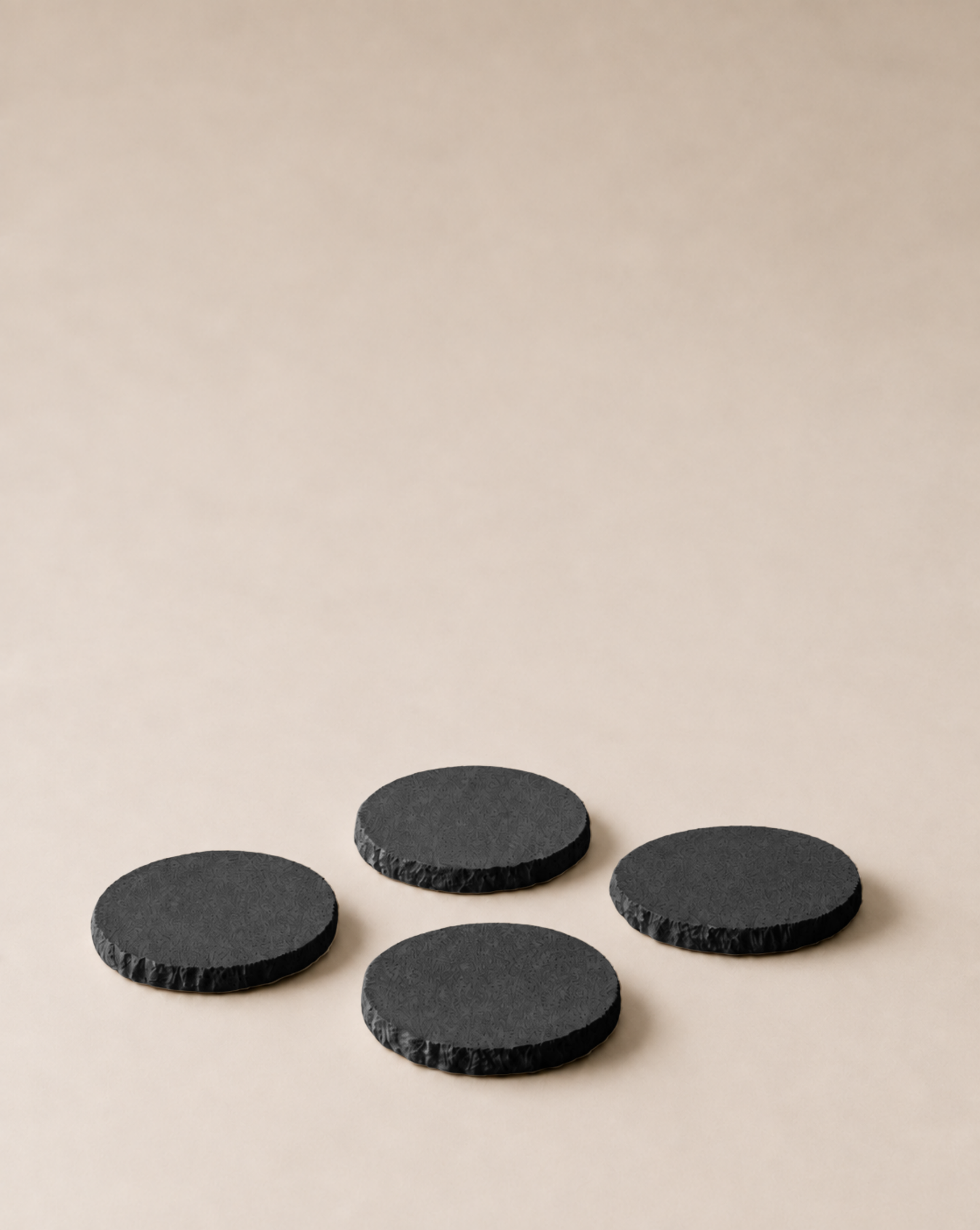 hand-poured micro concrete coasters, modern almond beige stone-look finish, minimalist drink coasters, functional and stylish drink accessories, high-quality concrete home decor, eco-friendly coaster set, contemporary table decor, unique coasters for home, sustainable coasters for drinks, premium concrete drinkware, handmade coasters for dining or living room, versatile coaster set for glass, mug, or cup, perfect gift for home decor lovers, elegant and durable home accessories, ginaladeco