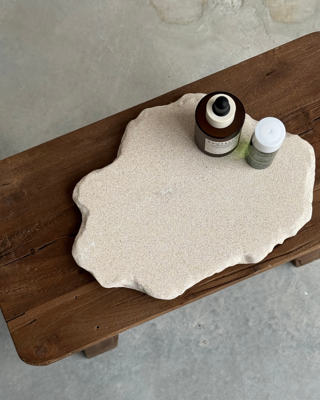 hand-poured micro concrete platter, minimalist serving tray, modern concrete decor, almond beige stone-look finish, versatile decorative tray for everyday objects, functional home decor piece, stylish tray for living room or office, high-quality concrete home accessories, sculptural centerpiece for table or countertop, eco-friendly concrete tray, premium quality home decor, unique serving platter for kitchen or dining room, handmade tray, organization, bold decorative piece for modern homes, ginaladeco