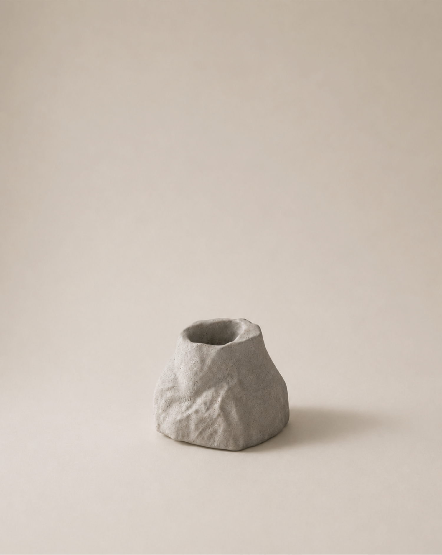 hand-poured micro concrete pen holder, almond beige stone-look finish, modern and minimalist desk organizer, stylish office decor, functional pen holder for home office, unique desk accessory, eco-friendly concrete desk storage, high-quality office supplies, contemporary home decor, versatile storage solution for pens, pencils, and office tools, sculptural office decor, perfect for desk or workspace, gift-ready pen holder, sustainable home office piece, elegant and practical desk organization, ginaladeco