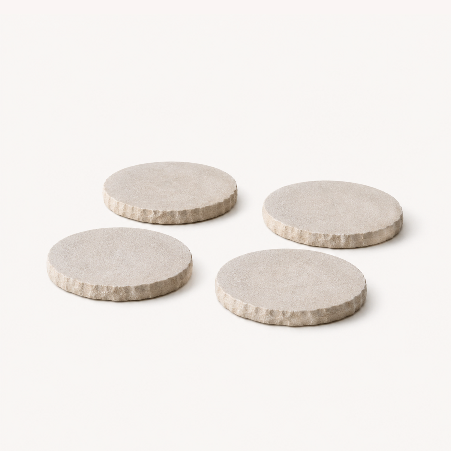 hand-poured micro concrete coasters, modern almond beige stone-look finish, minimalist drink coasters, functional and stylish drink accessories, high-quality concrete home decor, eco-friendly coaster set, contemporary table decor, unique coasters for home, sustainable coasters for drinks, premium concrete drinkware, handmade coasters for dining or living room, versatile coaster set for glass, mug, or cup, perfect gift for home decor lovers, elegant and durable home accessories, ginaladeco